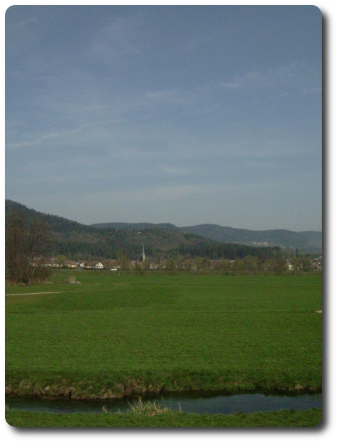 Vue vers Saint-Amé depuis Peccavillers à travers la plaine de la Moselotte